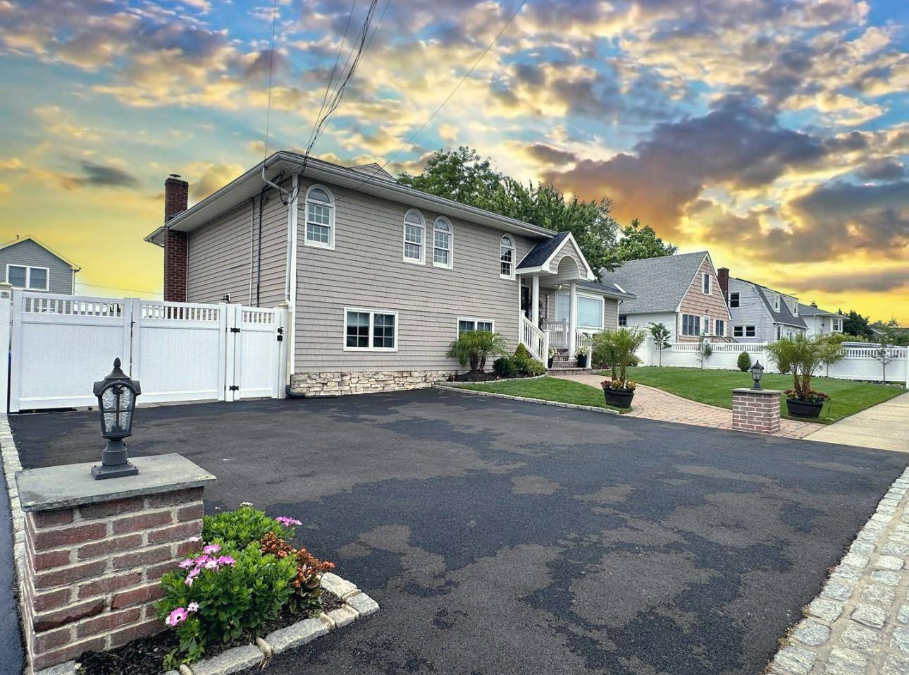 Welcome Home to waterfront living at its finest in this beautifully remodeled split level home, ideally situated in Amity Harbor.