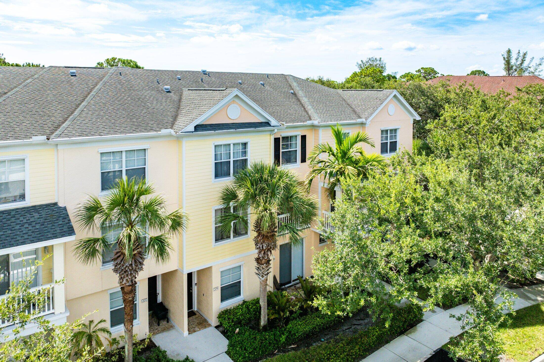 Charming townhouse style condo in the sought 8209 ; after Somerset at Abacoa community.