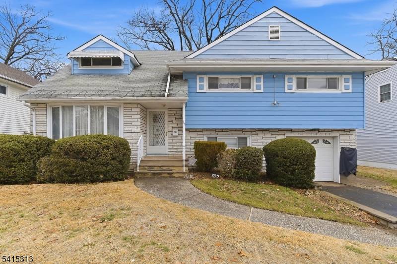 Welcome to this spacious tri level home offering exceptional potential in the heart of Teaneck !
