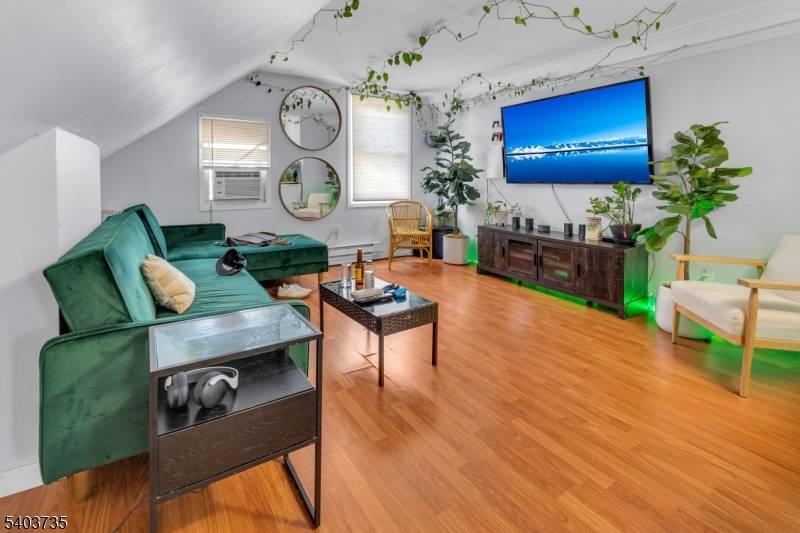 Charming Legal 2 Family in Prime Weehawken with NYC Views Outdoor SpaceTucked away on a quiet street just one block from direct NYC bus lines, this legal 2 family home ...