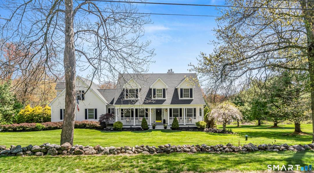 Welcome to 124 Luke Hill Road, a stunning custom built home set on two gorgeous, meticulously manicured acres.