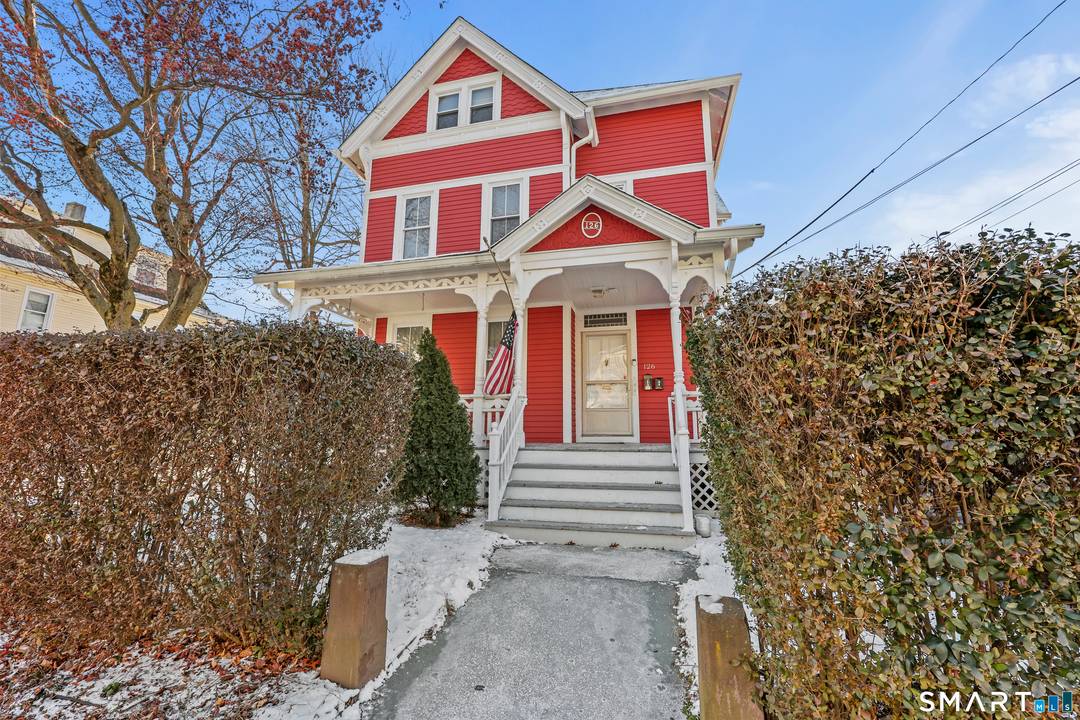 Classic two family home on a quiet New Britain street offering strong flexibility for owner occupants or investors, with a walk up attic providing potential for a future third unit.