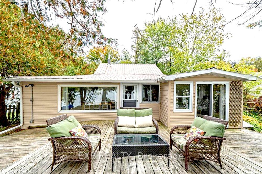 Enjoy amazing views, stunning sunsets, and wake up to the sound of birdsongs at this Oak Lake lakefront cottage.