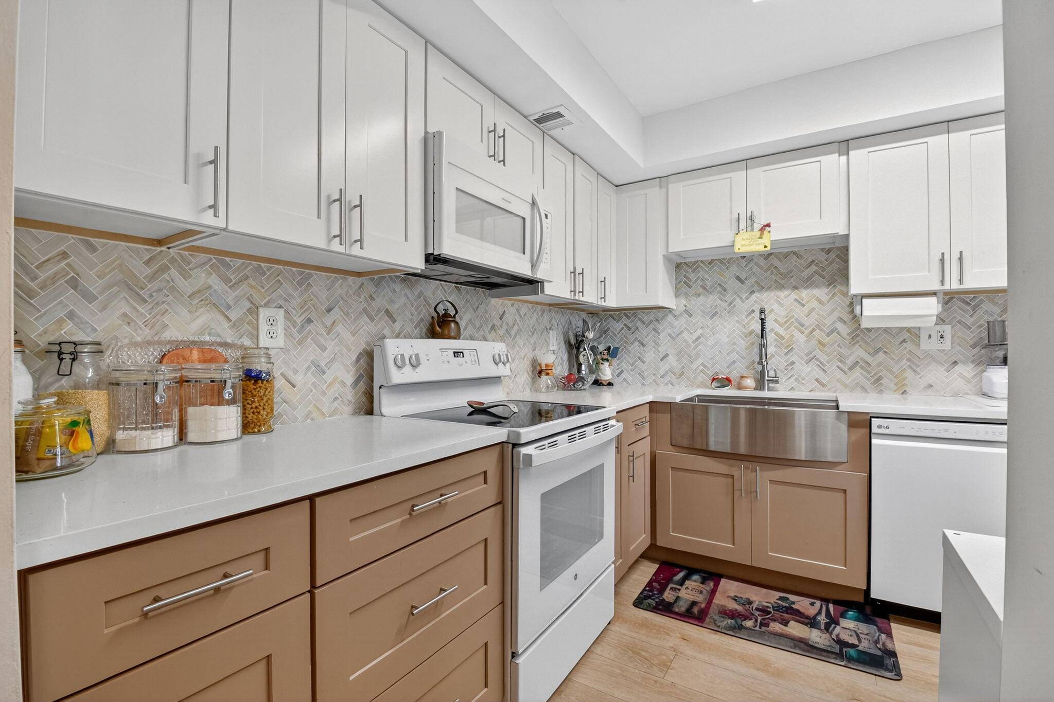 Beautifully renovated first floor condo featuring complete updates within the past two years.
