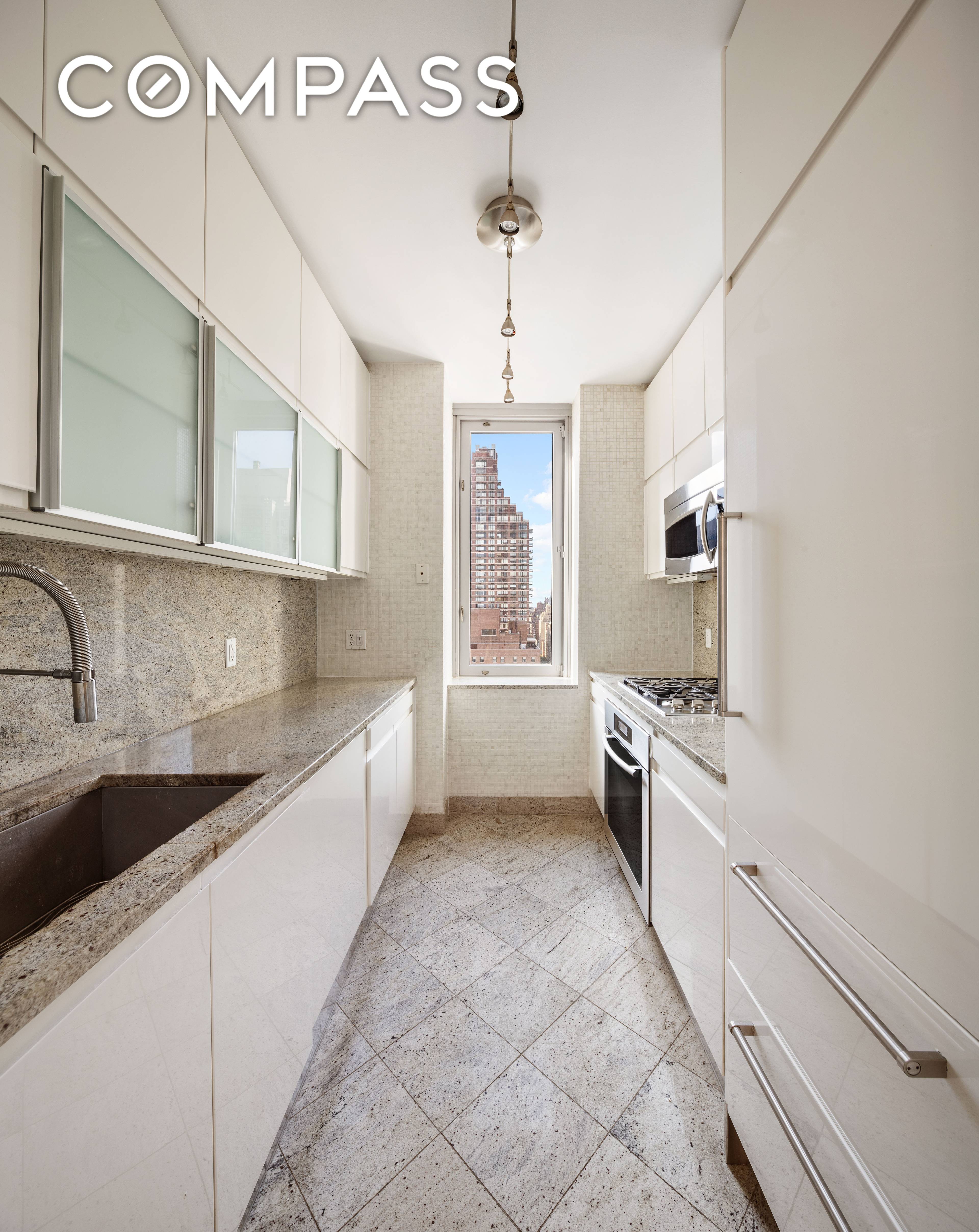 Step into a world of refined comfort at the esteemed Belaire Condominiums on the 28th floor.