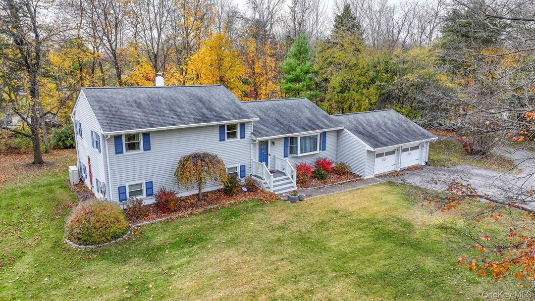 In Fishkill, this beautiful split level home offers 3 spacious bedrooms and 2.