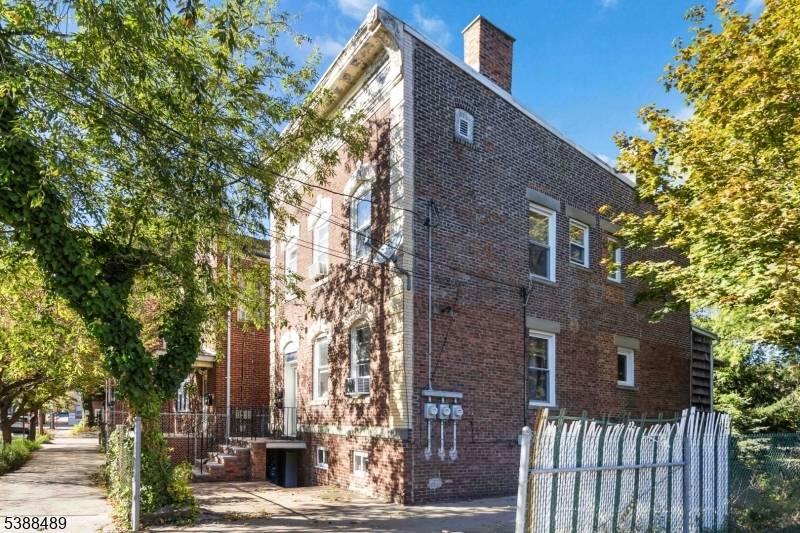 Opportunity awaits in this solid all brick 2 family home located in a desirable neighborhood just minutes from Bay St.