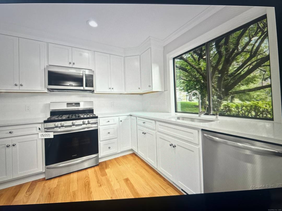 Welcome to Your Newly Renovated Home This stunning unit sits on the 8th hole and has year round views of the Housatonic River !