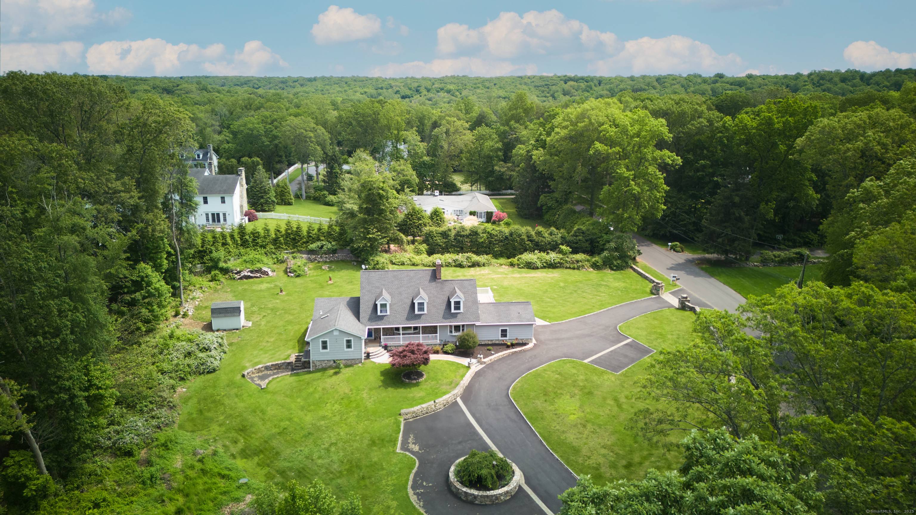 This meticulous home was rebuilt and expanded in 2015, refinished floors and fresh paint in 2025, and is located on 2 sunny acres in lower Weston.