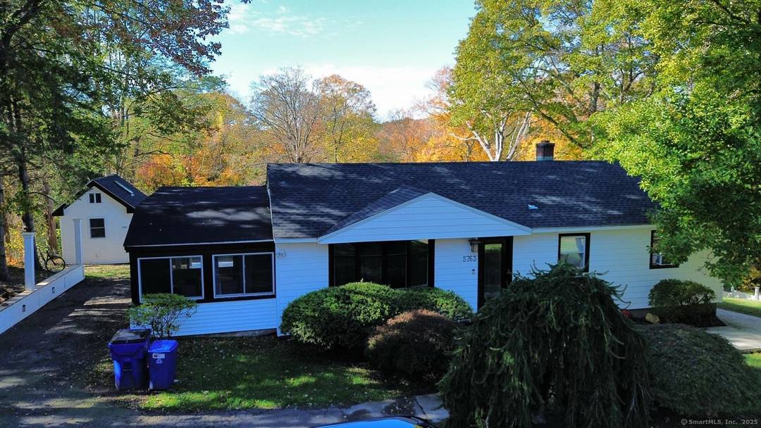 This ranch style sits on a generous lot and has a nicely landscaped backyard.