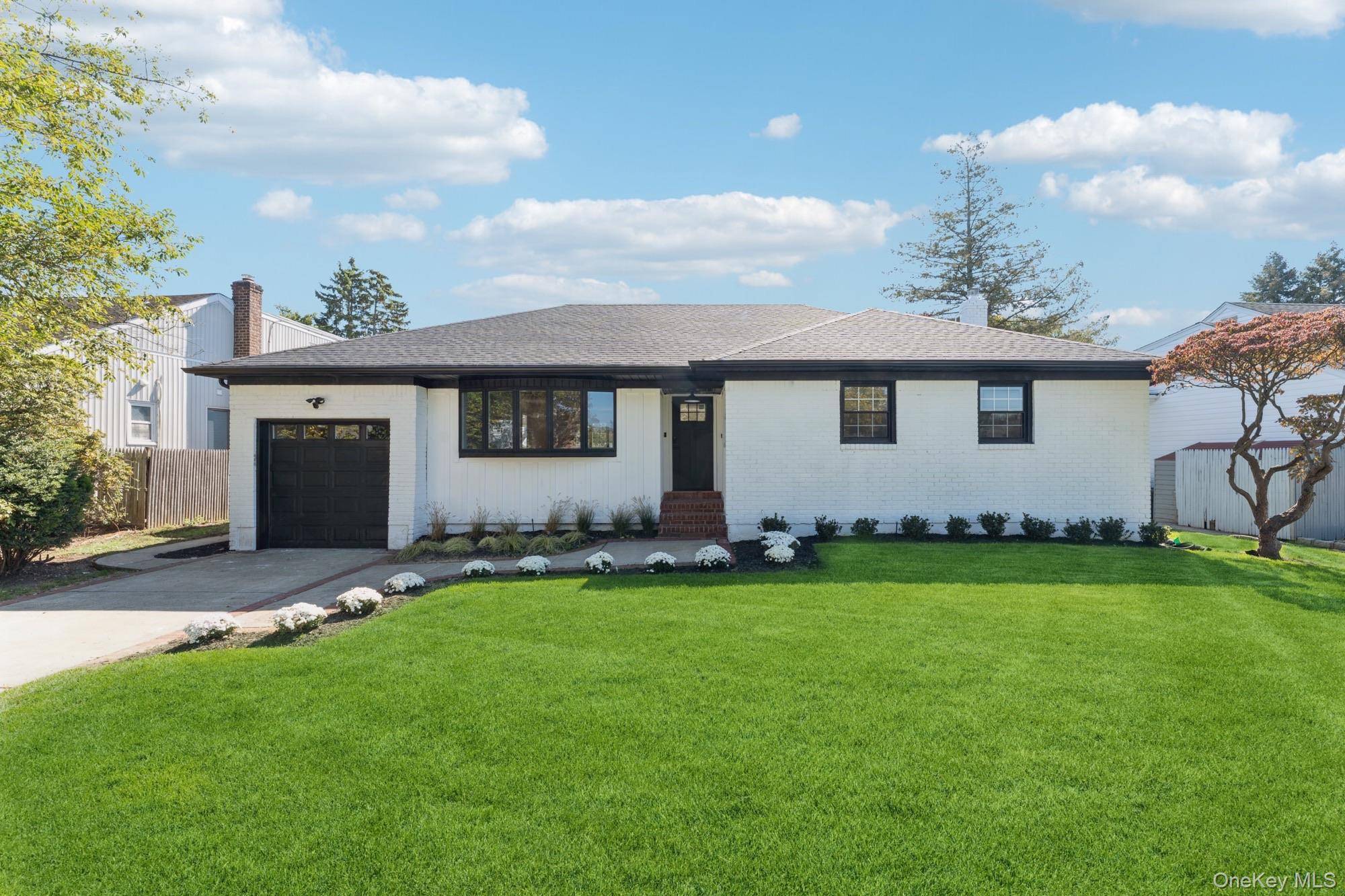 Welcome to 1460 Tyler Avenue, a fully renovated 3 bedroom, 2 bath ranch located in the desirable Barnum Woods Elementary District of East Meadow.