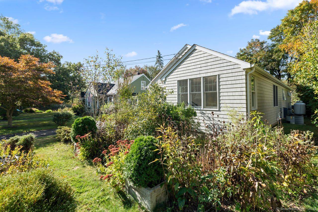 Welcome to this beautifully remodeled ranch style home that exudes the cozy feel of a beach cottage.