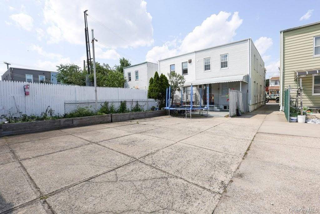 Beautiful two family home with huge backyard in vibrant neighborhood of Ozone Park, Queens.