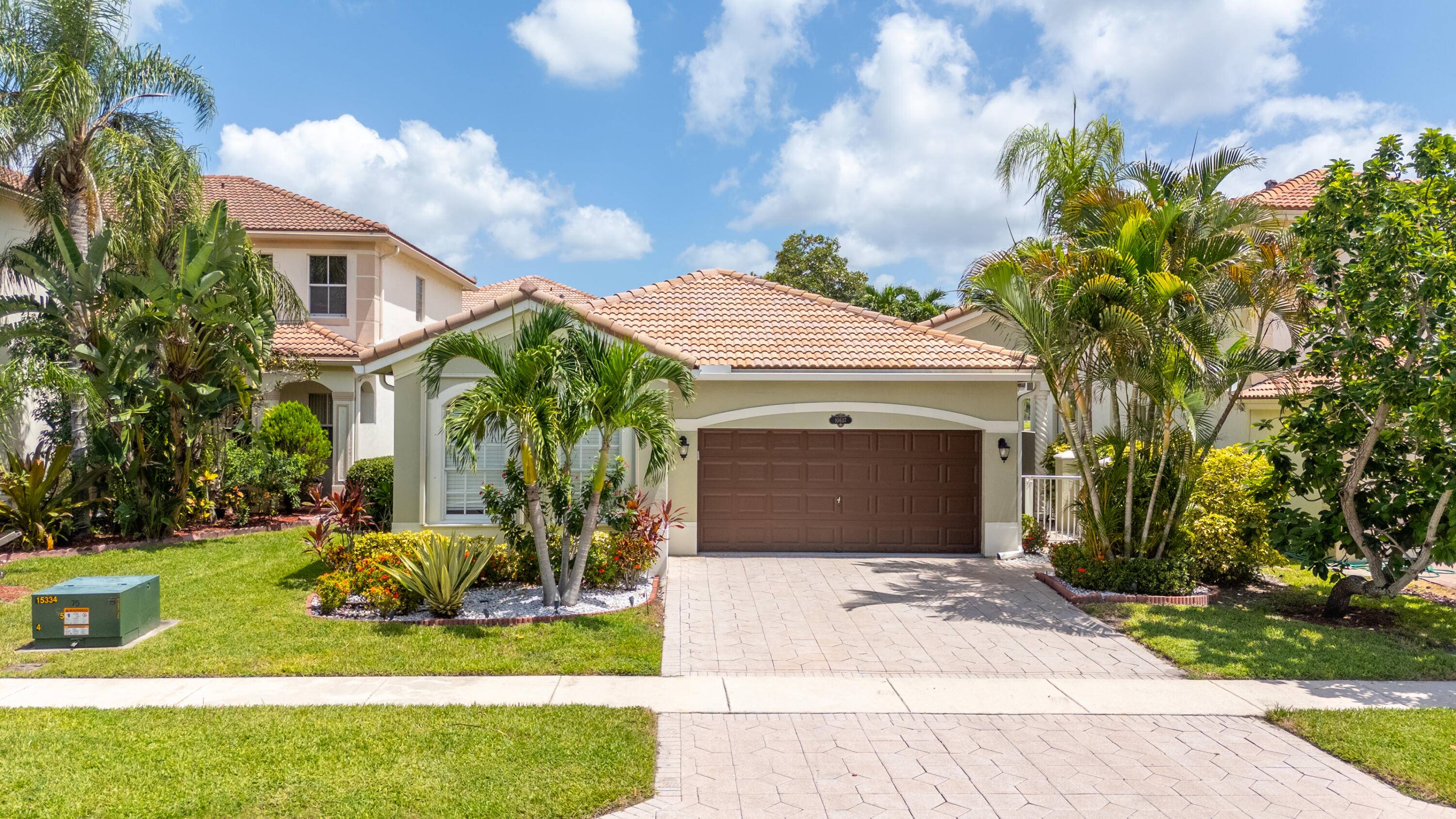 RARE OPPORTUNITY Fully Renovated 4 Bedroom, 3 Bath Lakefront Home in the highly desirable Black Diamond at Wellington !