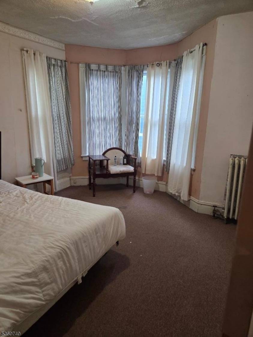 This home is a halp duplex with 3 spacious bedrooms, a living and formal dining room with fire places.