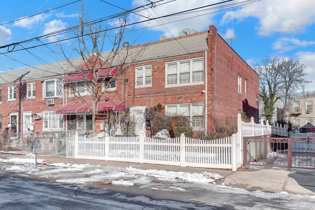 This two story home features five bedrooms, two full baths, two eat in kitchens, and a two car garage.