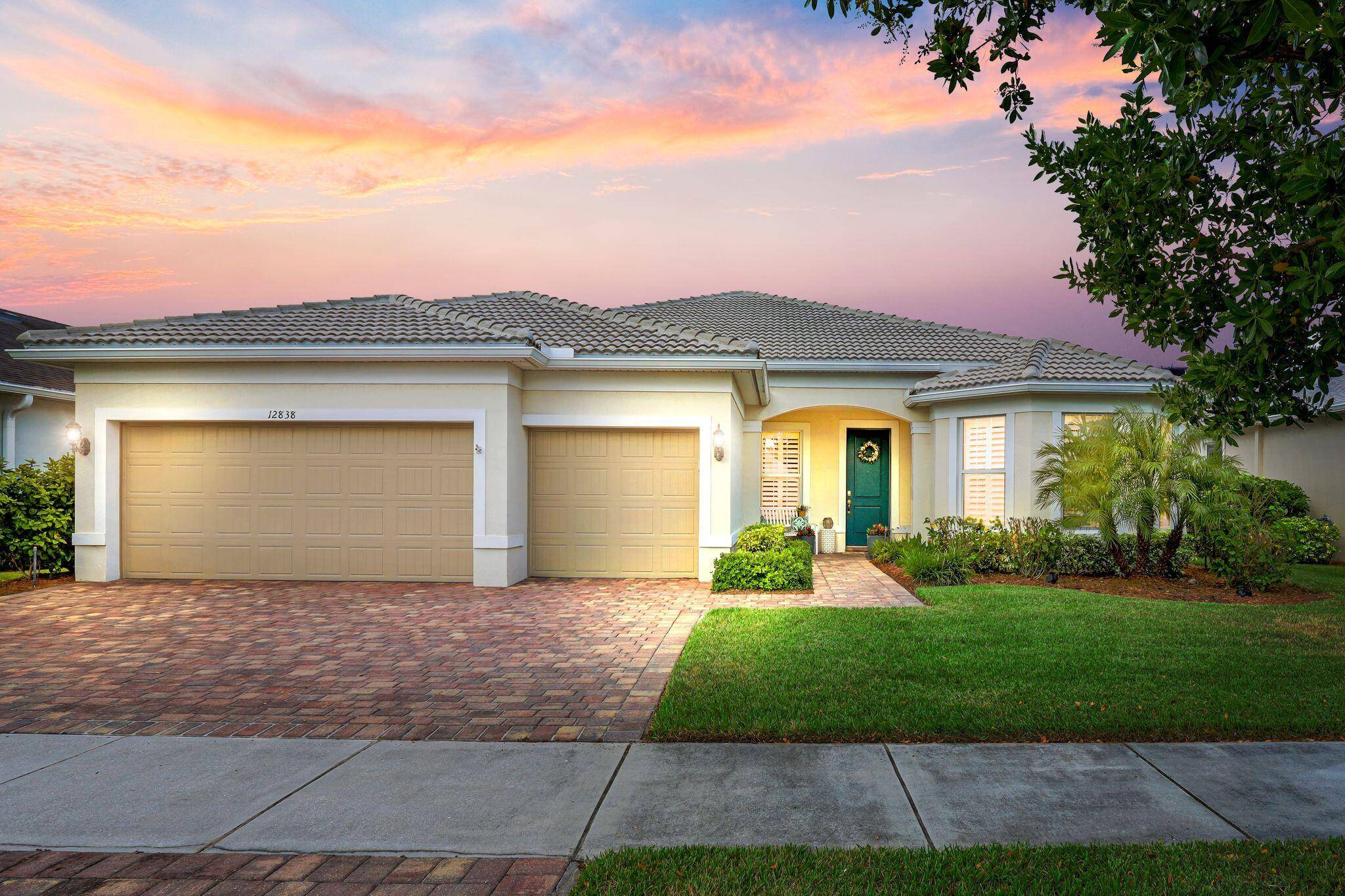 This stunning Pinnacle model is on a premium lot that overlooks the peaceful preserve in the lovely Del Webb at Tradition community.