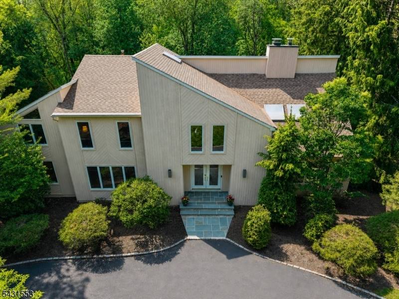 Nestled at the end of this mature tree lined cul de sac on.