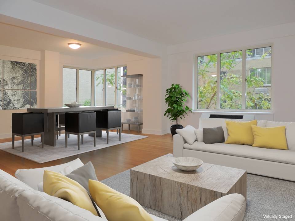 Very spacious, bright and sunny corner apartment with dining room and large separate window kitchen.