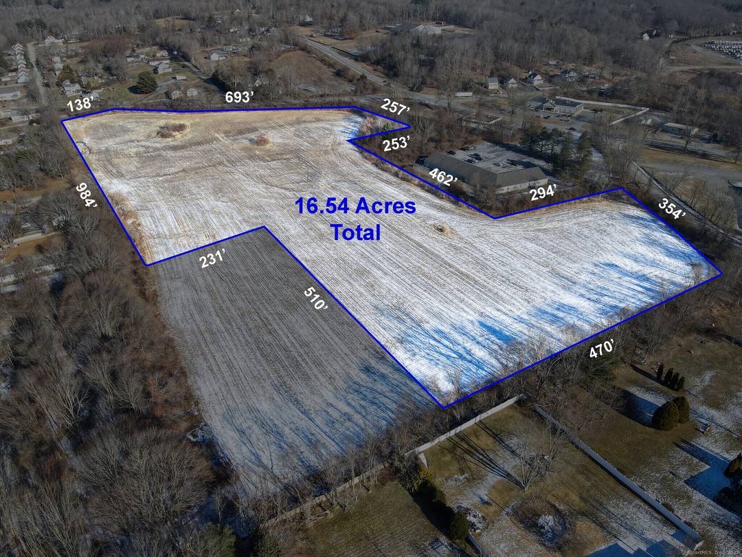 Unlock the potential of over 17 acres of prime commercial land at 0 Wauregan Road, strategically located in the growing town of Plainfield.