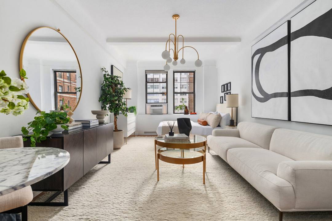 Welcome to Apartment 704, a prewar studio with high ceilings and southern exposure in a luxury coop just minutes from Central Park.