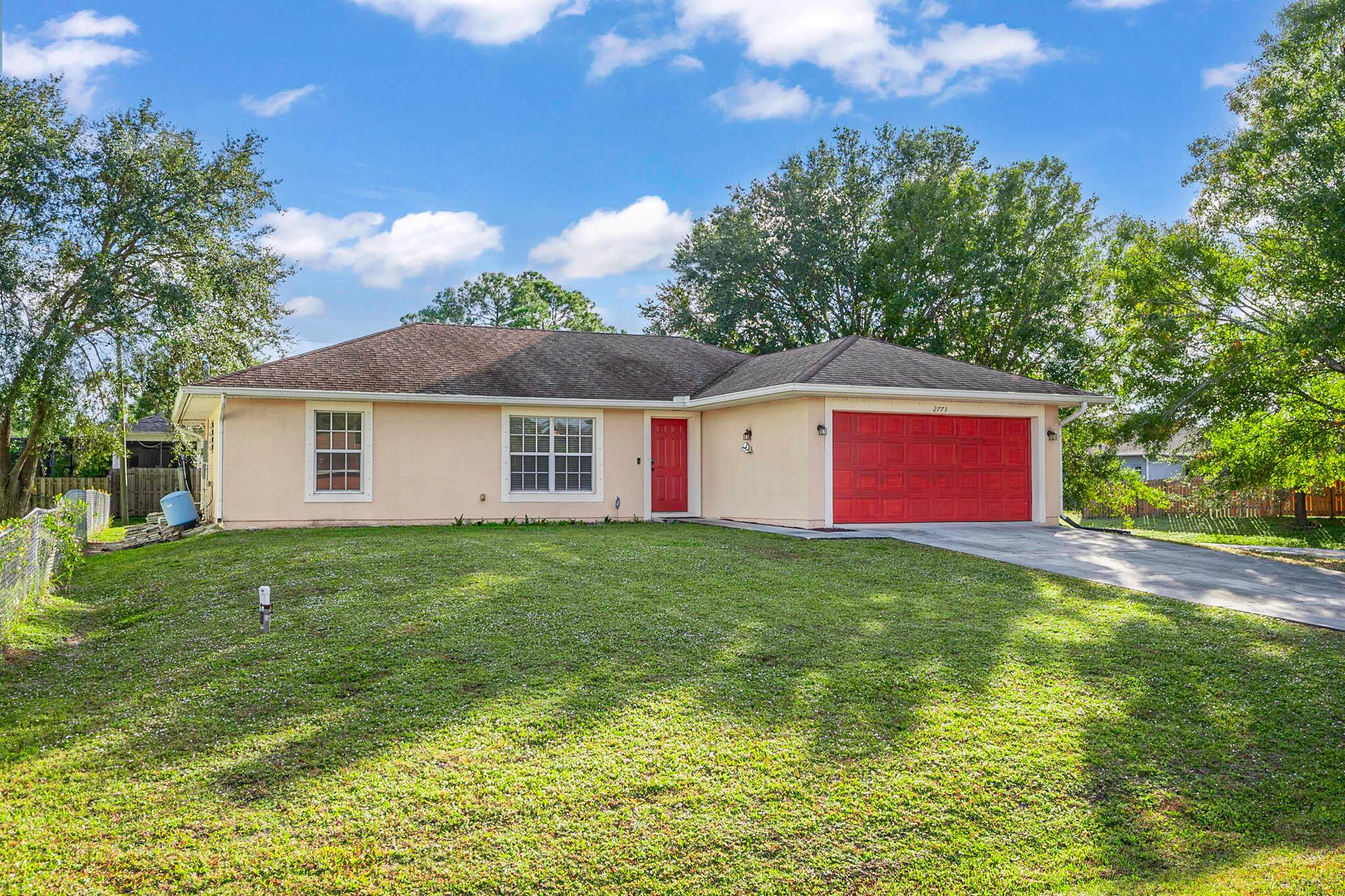 Charming 3 bedroom, 2 bathroom open floor plan home with a 2 car garage on a desirable corner lot.