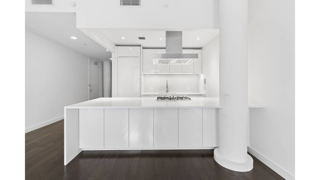 AVAILABLE END OF JULY ! Handsomely laid out 1, 035 square foot alcove loft with 10 ceilings and oversized east facing arched windows.