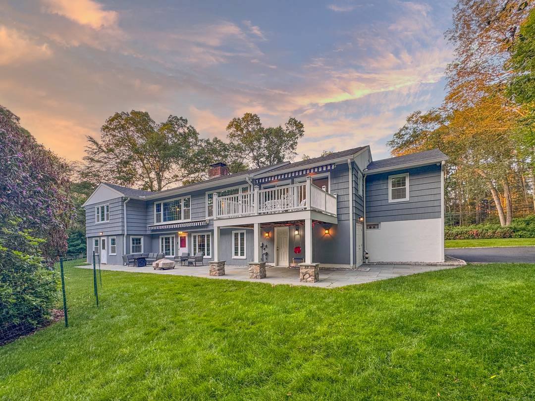 Discover a spacious and flexible Westport ranch on nearly 2 private acres.