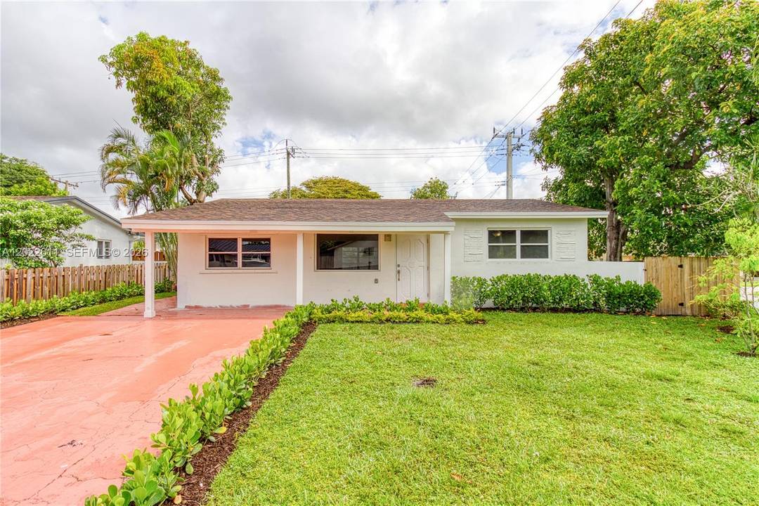 Charming 3 bedroom, 2 bath home situated on a spacious corner lot in central Hollywood.