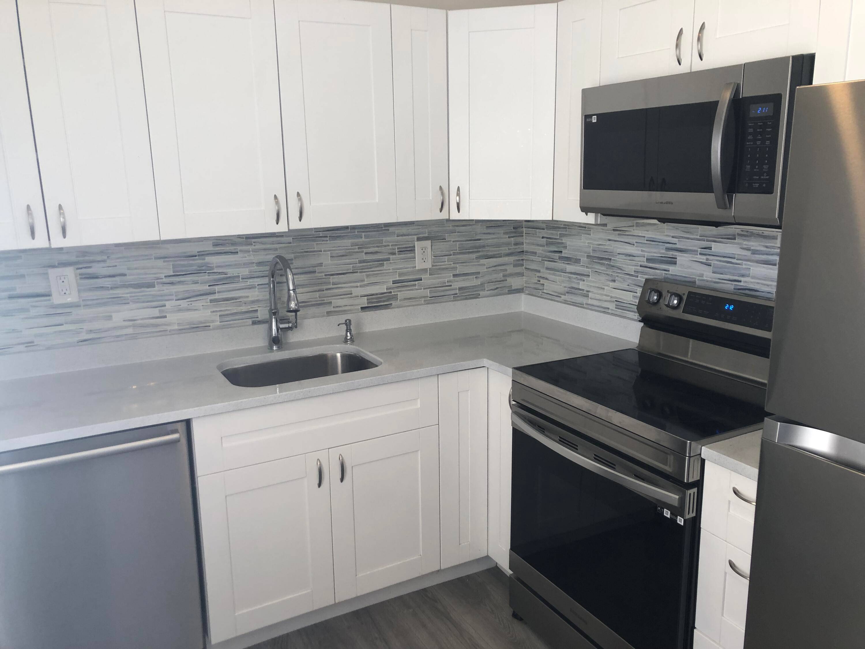 Updated 2nd floor 2 2 unit in highly desired Normandy D building with water golf course view from living room.