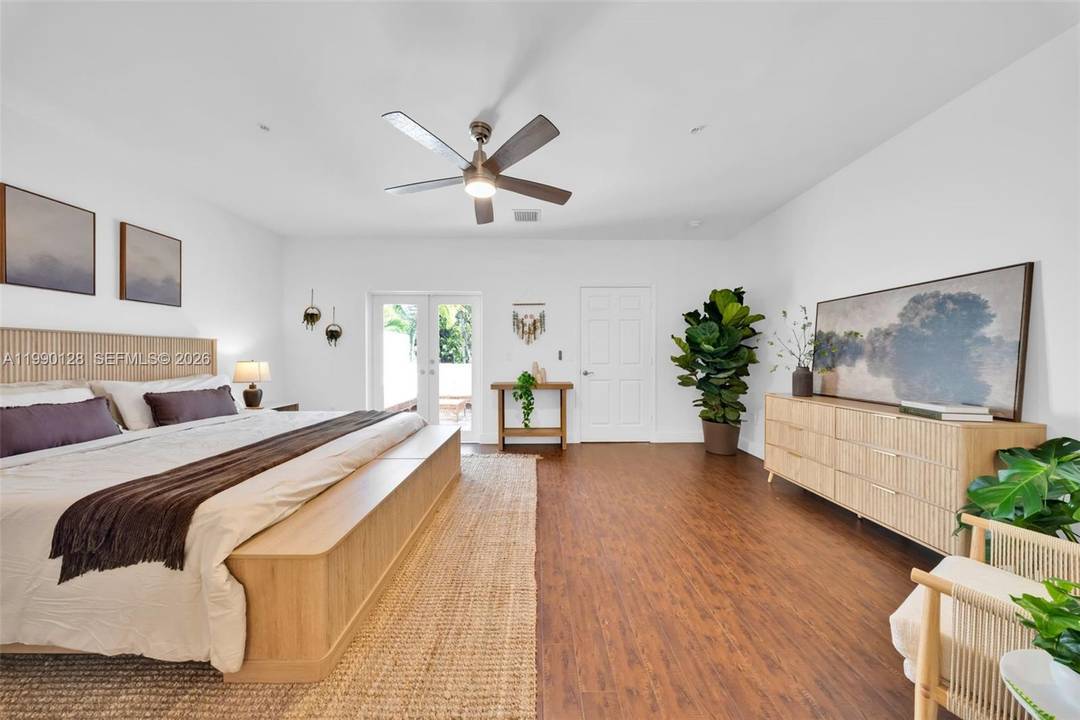 Spacious tri level townhouse located in walkable North East Coconut Grove.