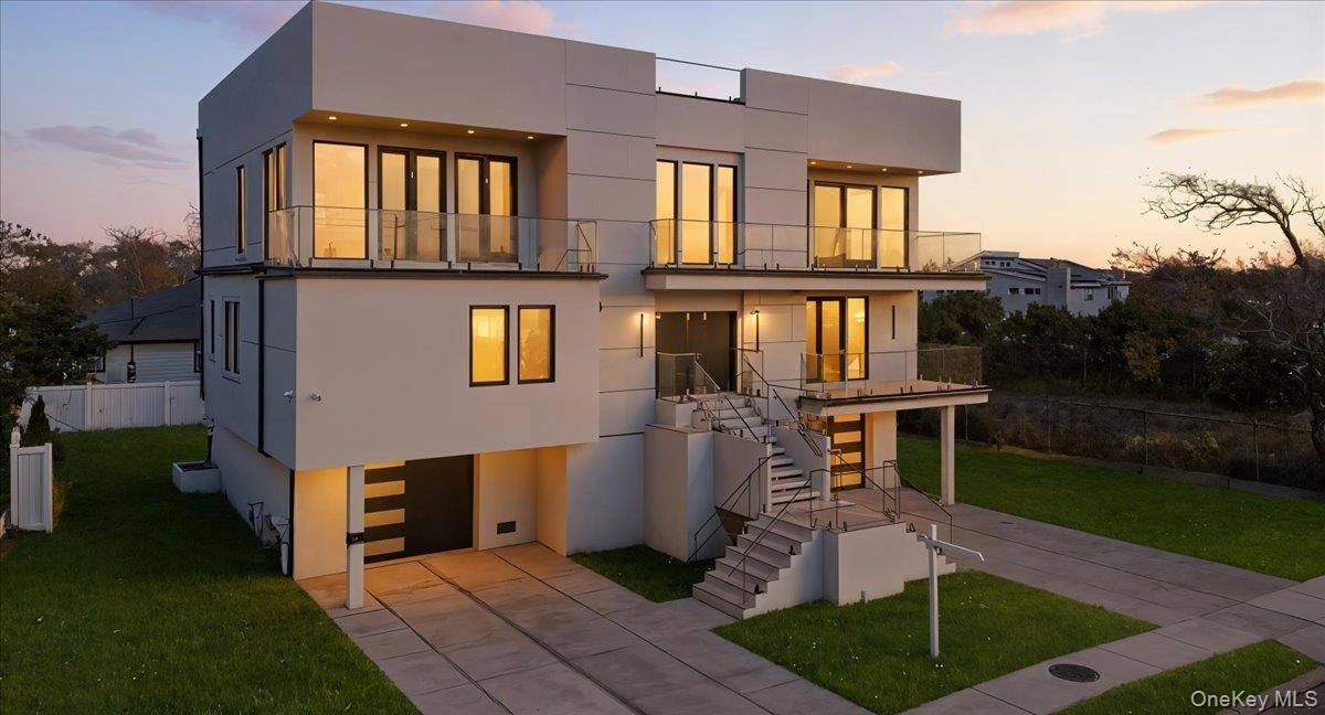 Step into a modern masterpiece designed for seamless living and effortless entertaining, all set against the backdrop of sweeping ocean views !