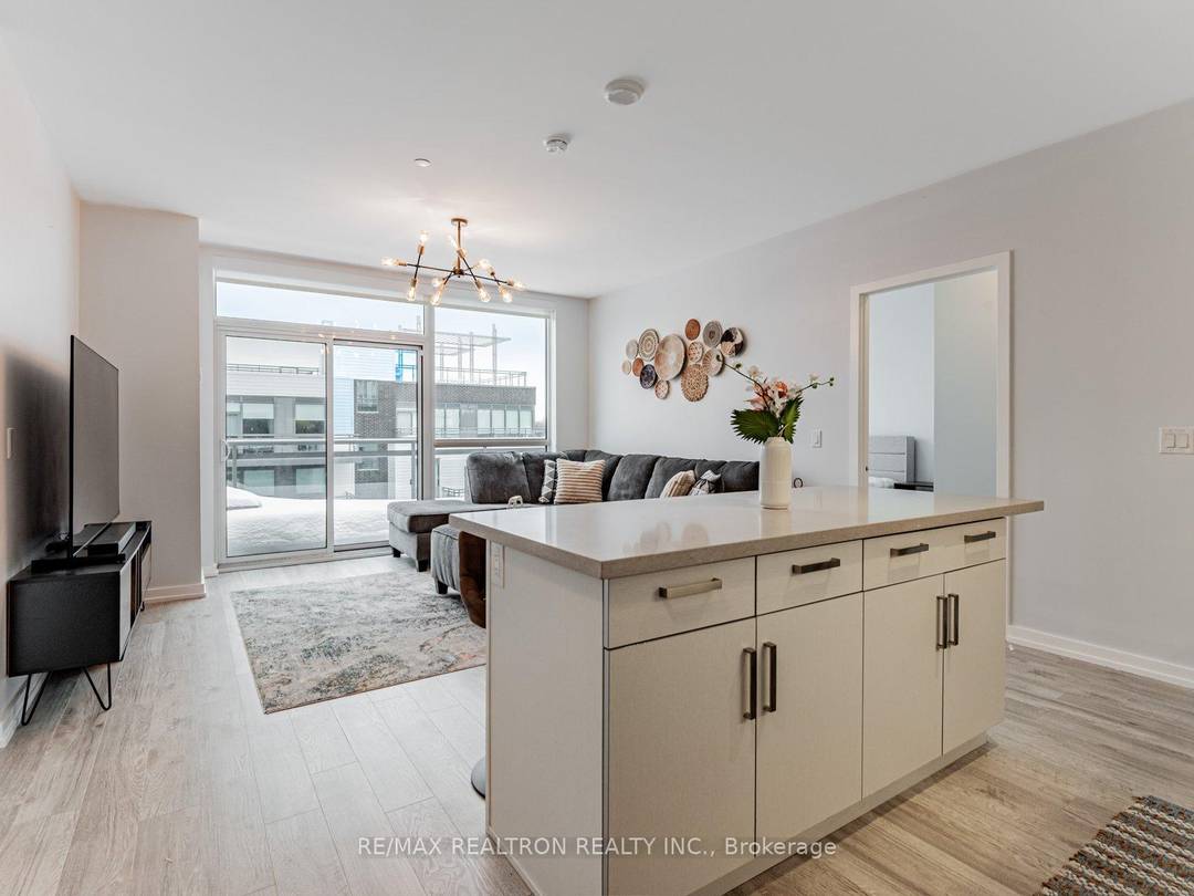 Rare penthouse water view condo This beautifully maintained residence is exceptionally bright, enhanced by floor to ceiling windows and soaring 10 foot ceilings that create an open, airy atmosphere throughout.