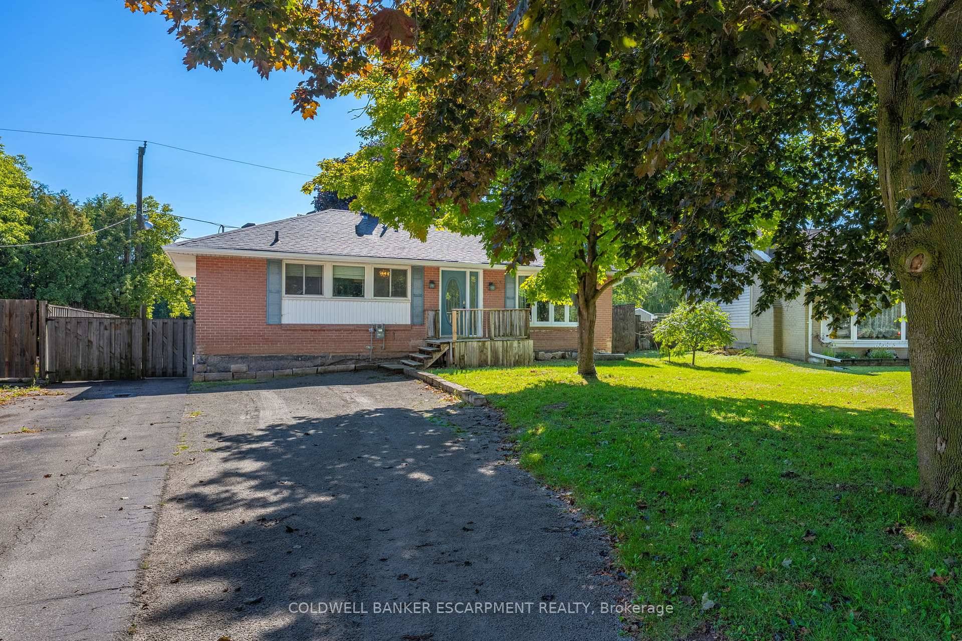 Huge Lot on a Sleepy Street with In Law Potential !
