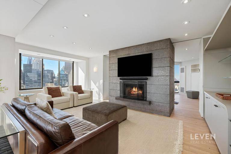 Perched high on the 41st floorjust below the penthouse levelthis fully furnished, three bedroom, three and a half bathroom residence at The Savoy Condominium offers a rare combination of scale, ...