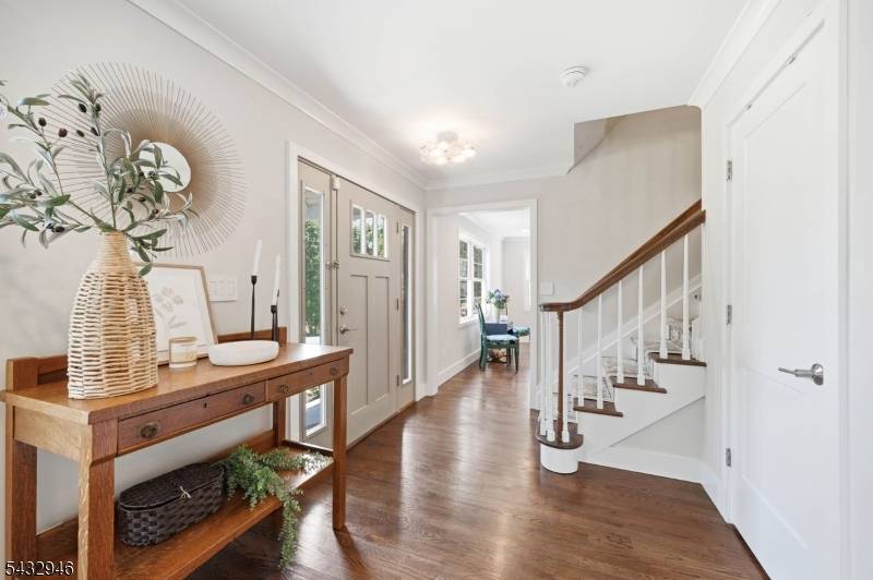 Stunning custom Colonial rebuilt expanded in 2017, offering 4 bedrooms, 3.