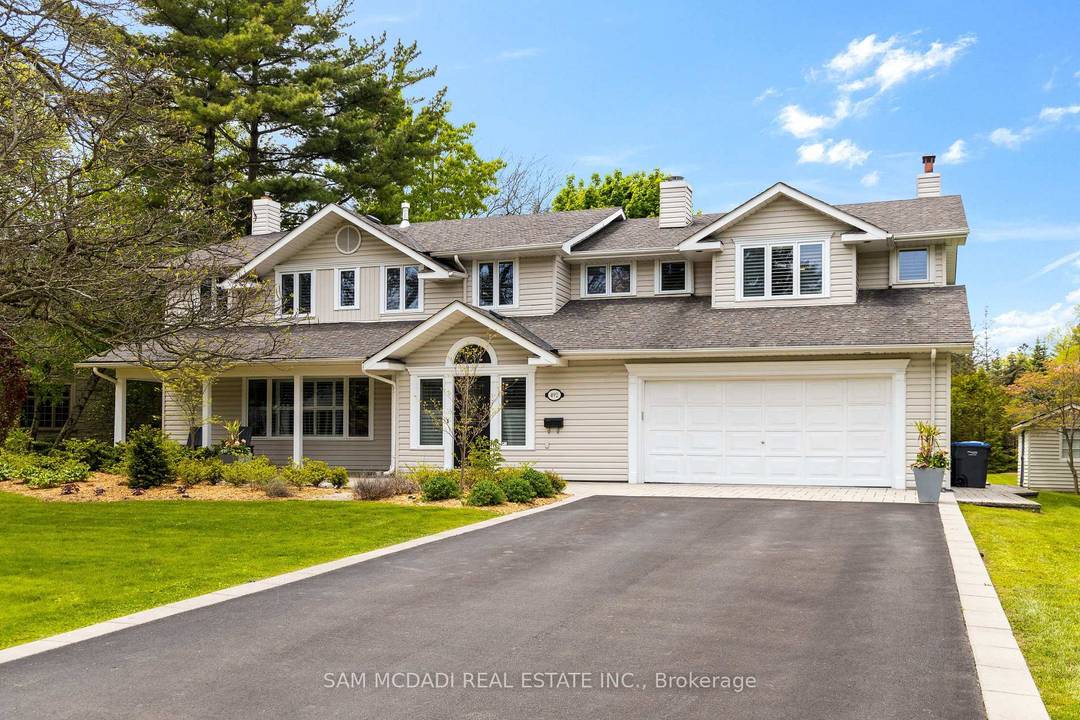 Welcome to your dream home in the heart of Clarkson Village, where timeless elegance meets modern living.