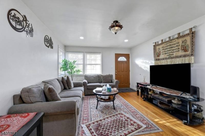 A BEAUTIFUL CAPE COD HOUSE IN THE DESIARED CLIFTON AREA, HARDWOOD FLOORS, 4 BEDROOMS AND 2 FULL BATH, ATTACHED CAR GARAGE AND NICE FINISHED BASEMENT.