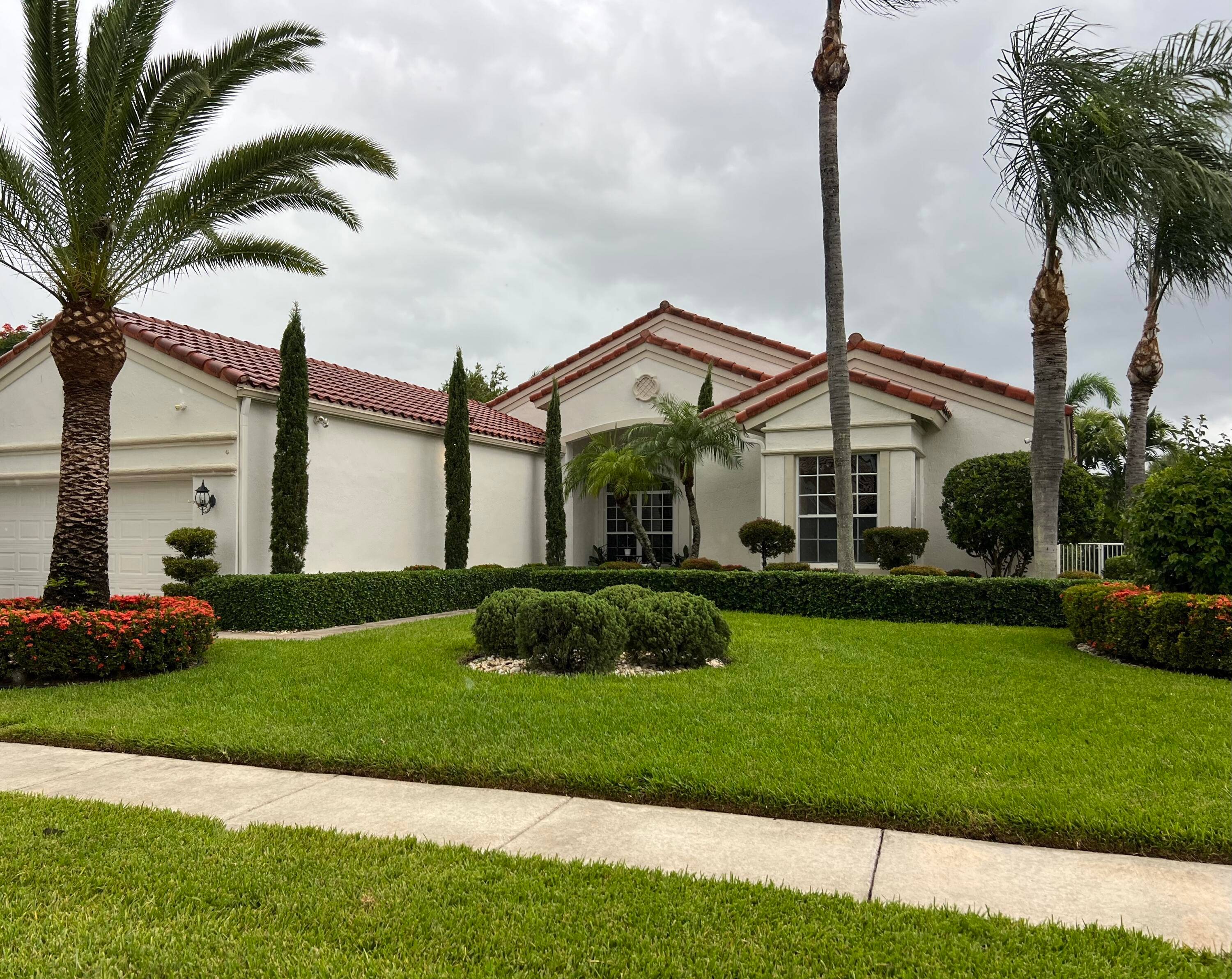Welcome to 9627 Bergamo Street, a beautifully renovated single family home nestled on a desirable corner lot in Lake Worth on the Wellington line.