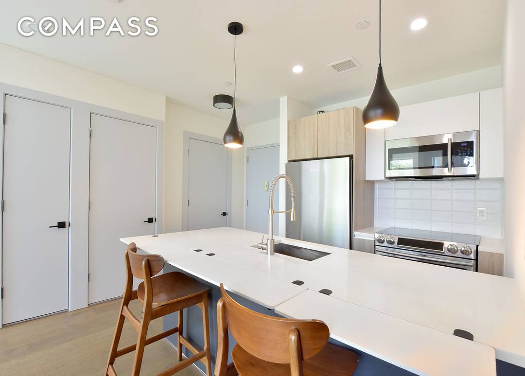 Beautifully renovated 2 bedroom condo featuring an open concept layout with floor to ceiling windows and sunny southern exposure.
