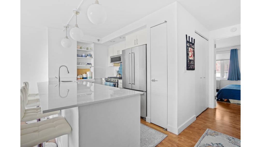 This sophisticated 2 bedroom 2 bath condominium has a well thought out interior that is bright and elegant.