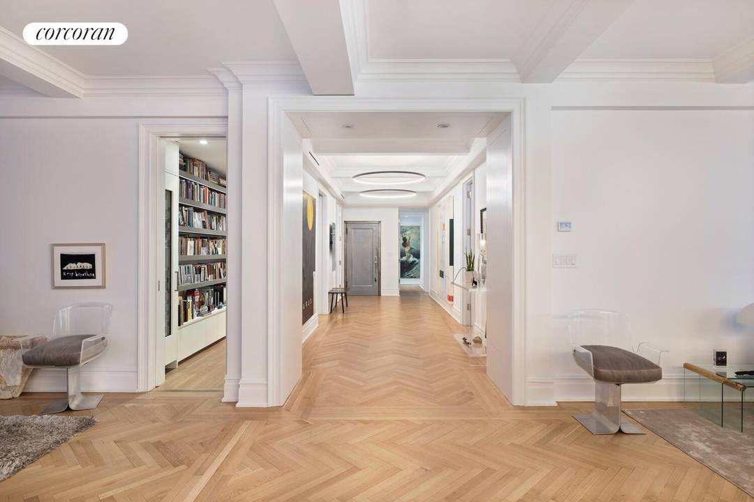 Welcome to residence 9C at 1185 Park Avenue, a reimagined classic eight that perfectly balances prewar grandeur and chic modern living.