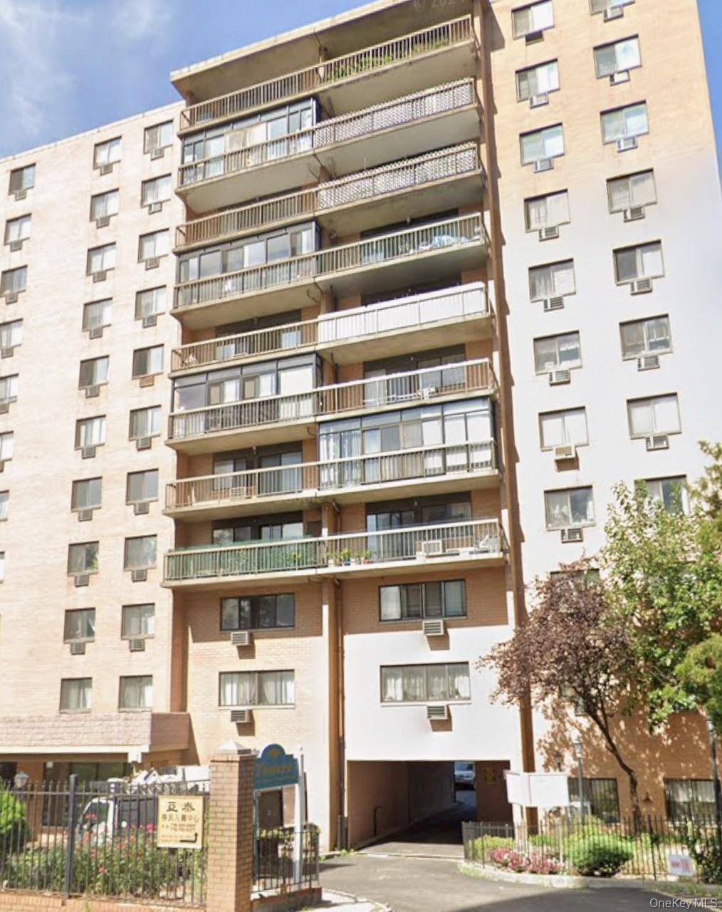 Large one Bed Condo On a Top floor Located In the heart of downtown Flushing !