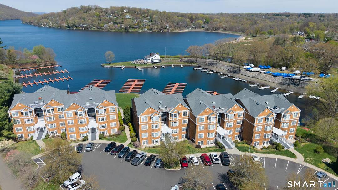 Feel like you're living in a luxury lakeside resort every day when you come home to this beautiful condo in the coveted Crystal Bay community on Candlewood Lake !