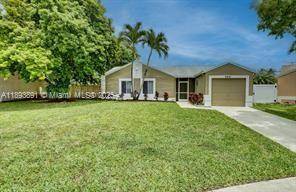 Beautifully updated 3 bedroom, 2 bath single family home located on a quiet cul de sac in the desirable Boca Landings community.