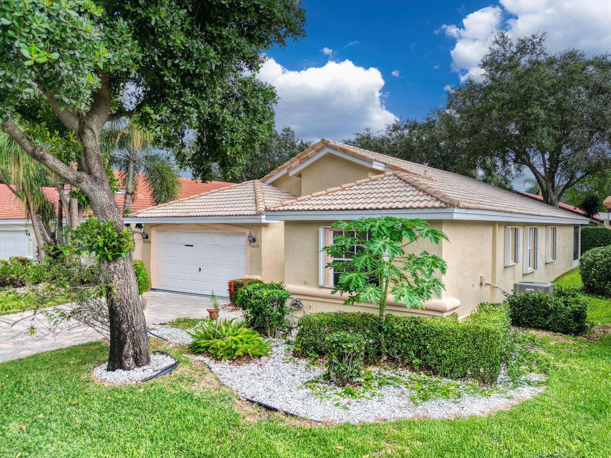 Welcome to this beautifully maintained 1 story residence nestled in one of Boynton Beach's most desirable and active communities.