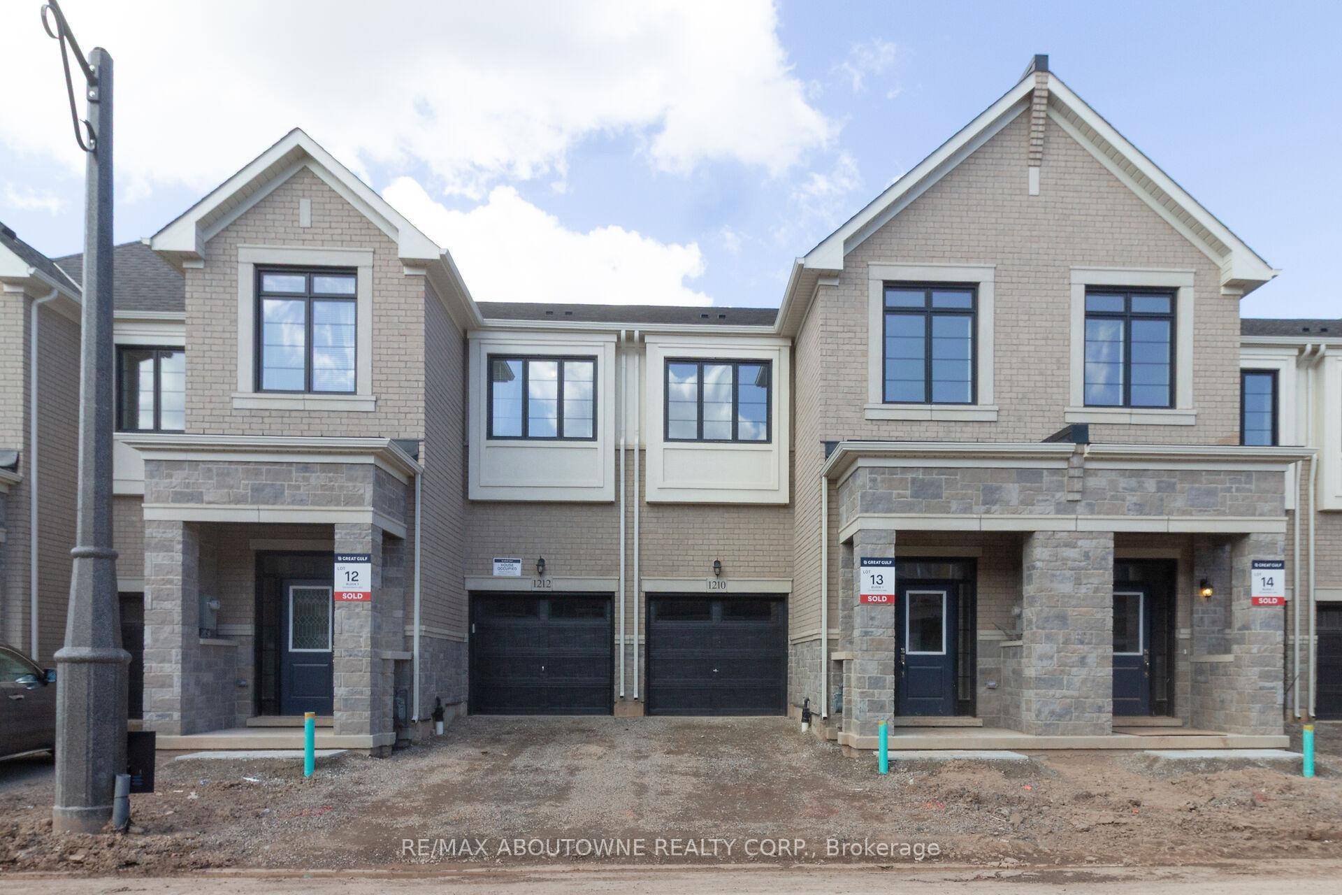 Welcome to 1212 Dartmouth Stunning 4 Bedroom Freehold Townhome Backing onto a Pond in Oakville !