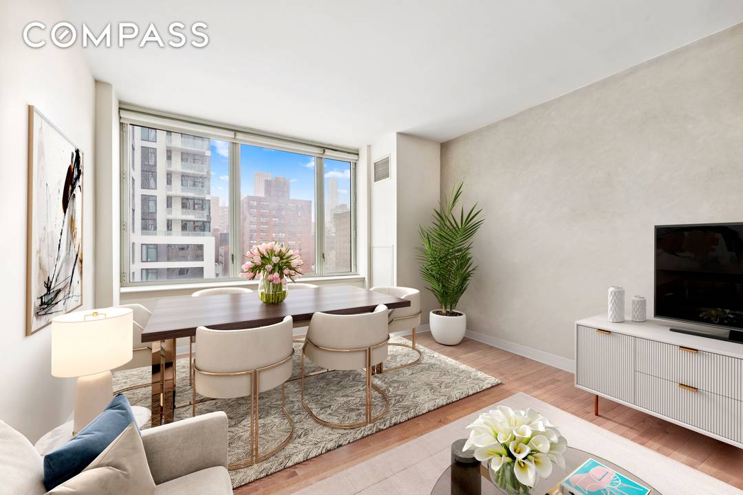 Coveted and rarely available, this two bedroom, two bathroom apartment offers incredible, panoramic city views and boundless light in the heart of bustling Murray Hill.