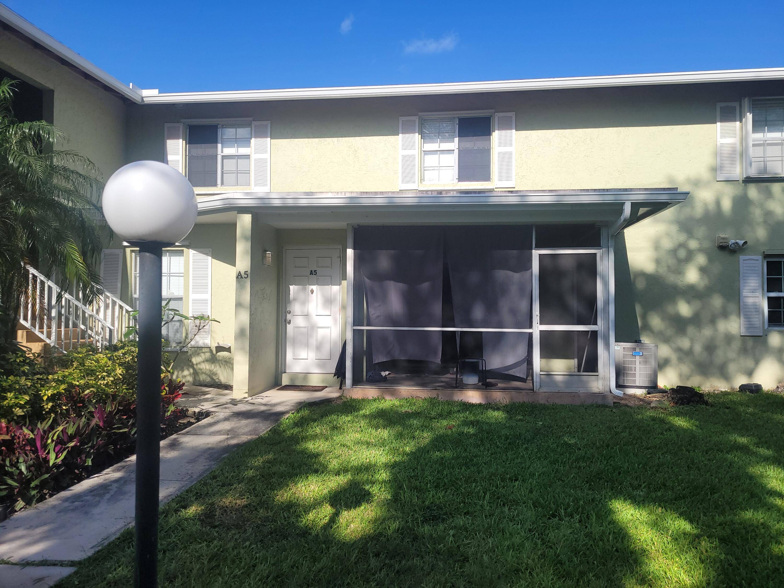 This two story townhome like condo features tile in the downstairs living spaces, updated kitchen bathrooms, stainless steel kitchen appliances, private covered and screened patio, just a few steps from ...