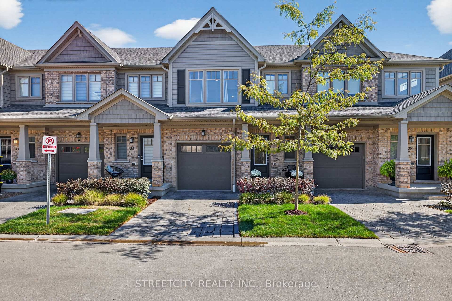 Welcome to Unit 37 2491 Tokala Trail a spectacular pond view condo that backs onto water in sought after North London.